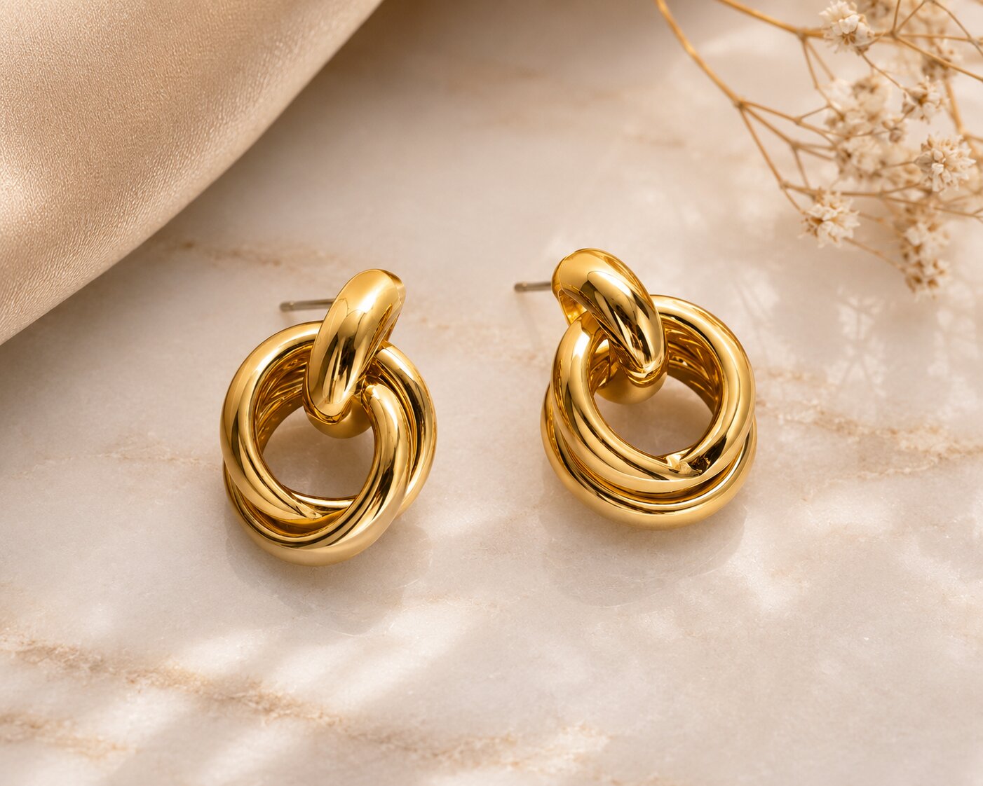 Twistelle Golden earrings