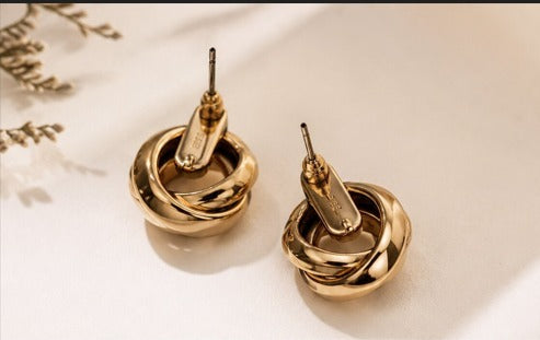 Twistelle Golden earrings